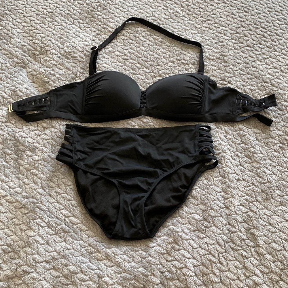 Blank 2 piece swimsuit. Tried on, never worn. Size 8.